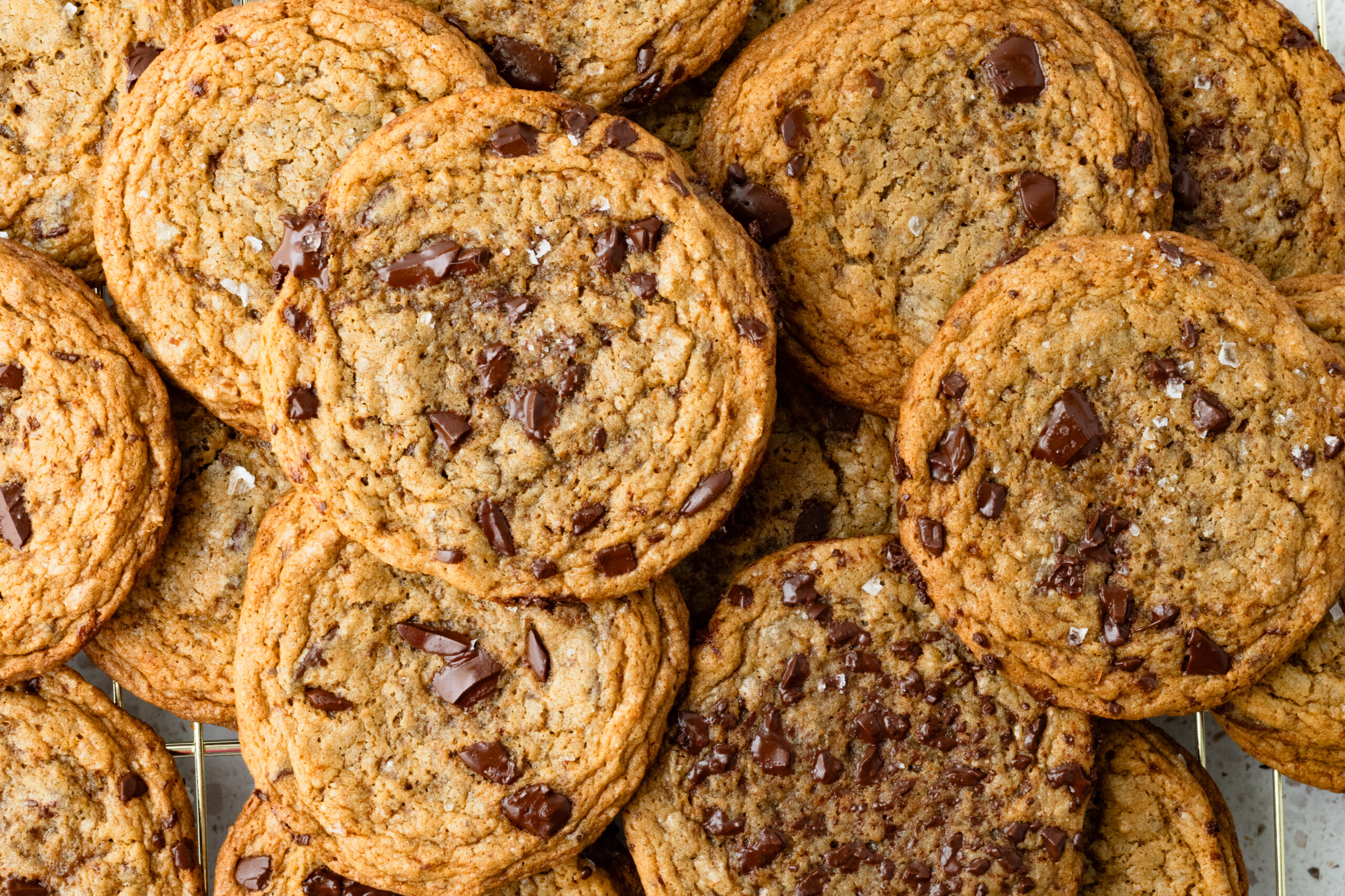 layers of einkorn chocolate chip cookies topped on each other for an overhead shot