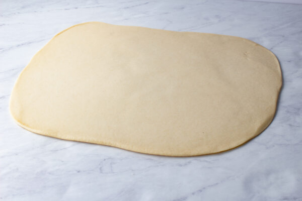 rolled out donut dough into a rectangle