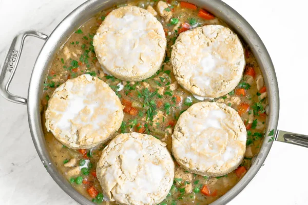 chicken pot pie with einkorn biscuit topping before baking