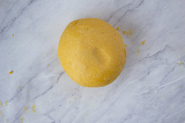 einkorn pasta dough ball with finger indent